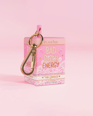 Pink lemonade scented keychain lip balm with 'Bad Bitch Energy' text on a pink background