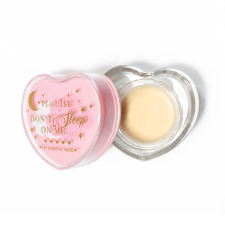 Pink heart-shaped lip sleeping mask with the lid off on a white background