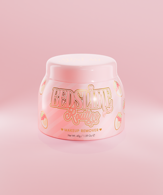 A pink jar of P.Louise Bedslime Routine Jelly Makeup Removing Cleanser with a strawberries and cream design.