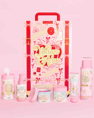 पी.लुईस लपेटा हुआ और तैयार सूटकेस